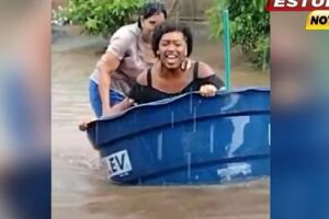 Transexual usa caixa d’água para escapar de enchente e salvar doguinhos (vídeo)