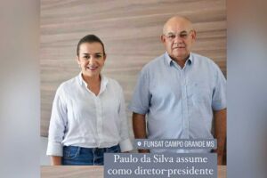 Adriane ao lado de Paulo