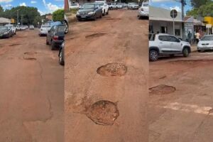 Buracos na rua Nova de Julho surpreendem pedestres e motoristas que passam por ela 