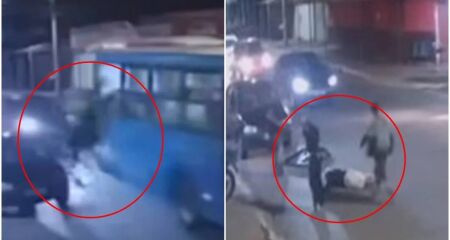 Imagens mostram o momento em que os dois vão parar no asfalto junto com a janela; motorista parou e prestou socorro