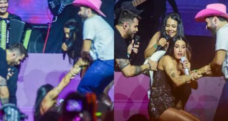 Apesar do susto, ela não se machucou, levantou com ajuda dos amigos e seguiu a apresentação
