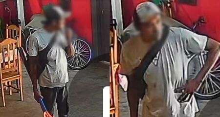 Homem entra e observa ao redor antes de cometer o crime