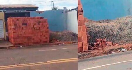 Uma m&atilde;e com carrinho de beb&ecirc; precisava andar quase no meio da rua para conseguir desviar dos materiais para constru&ccedil;&atilde;o 