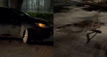 Morador flagra avenida sem luz e cheia de buracos