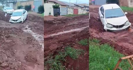 O condutor de um carro, que se aventurou ao tentar passar pela Rua Hailton de Almeida Lemos acabou caindo em uma das valetas abertas na via