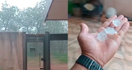 Morador registra pedras de gelo, ventania e enxurrada tomando via sem asfalto durante temporal