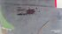 Arma apreendida no local