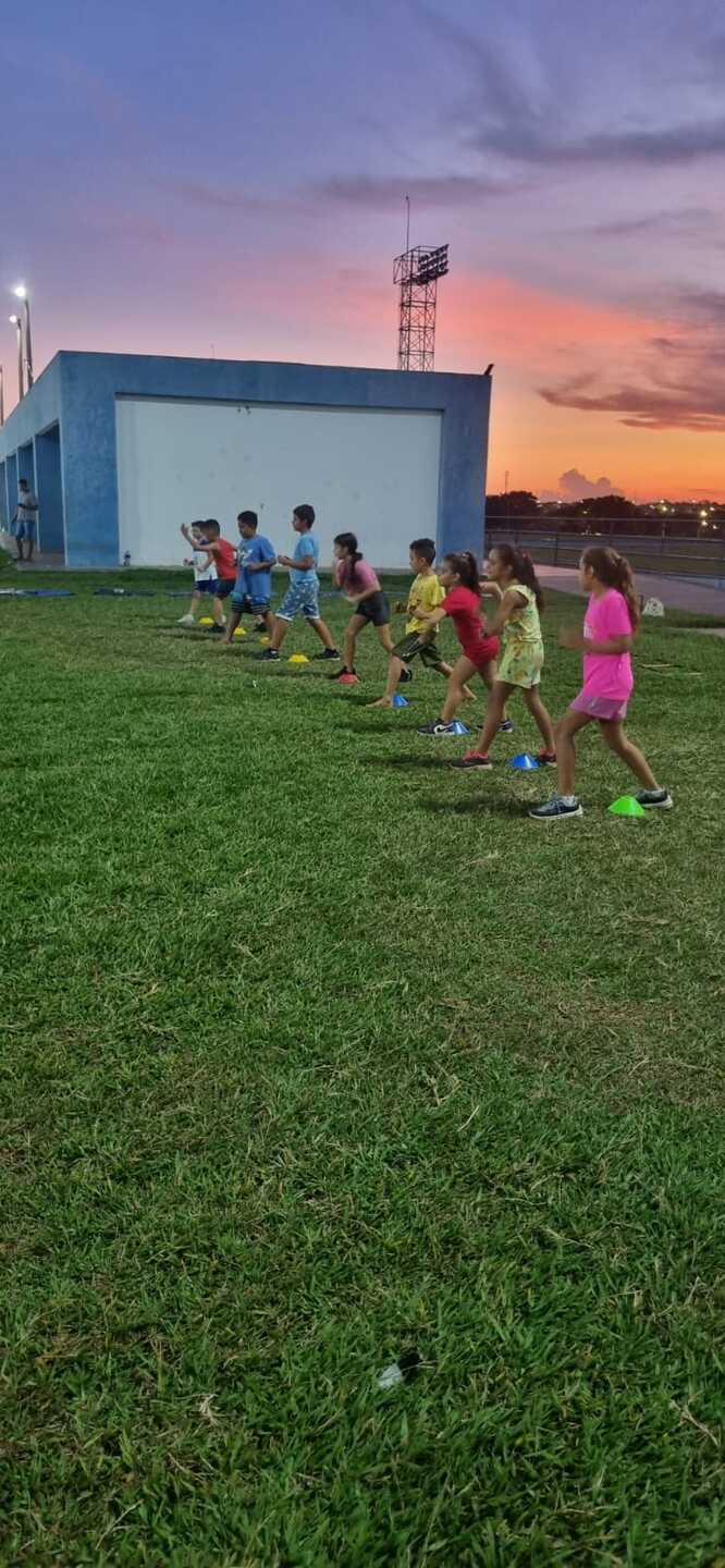 Cristiane e seus treinandos